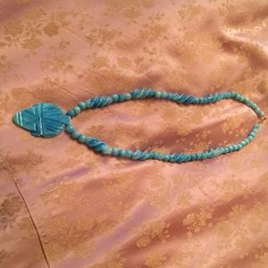 Blue necklace made out of glass beautiful